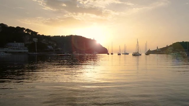 4k time lapse of sunset over the Mediterranean Sea at Port de Soller on the coast of Mallorca