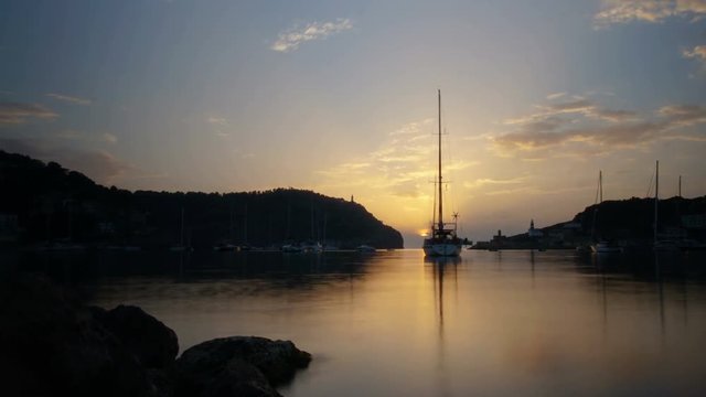 4k time lapse of sunset over the Mediterranean Sea at Port de Soller on the coast of Mallorca