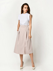 Young beautiful woman posing in new casual office cloth