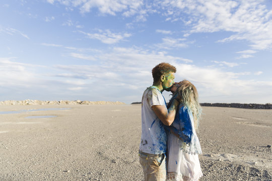 Painted couple of lovers kissing