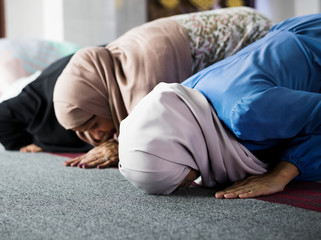 Muslim praying in Sujud posture
