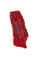 Beef Jerky Macro Isolated on White Background. Selective focus.