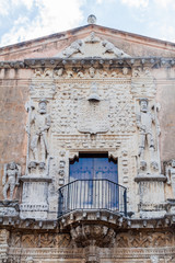 Fototapeta na wymiar Decoration of Casa de Montejo in Merida, Mexico. Triumphant conquistadors staying on heads of barbars.