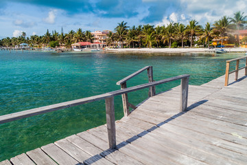 Fototapeta na wymiar View of Caye Caulker village from a wooden pier, Belize