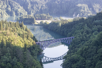 Fukushima, JAPAN - June 17 : The local train Tadami line and Tadami river on June 17 , 2017 in...