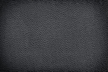 Old vintage black leather texture closeup for background