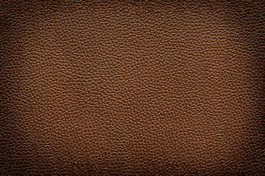 Old vintage brown leather texture closeup for background