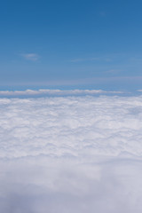 View from an airplane window clouds.