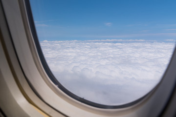 View from an airplane window clouds.