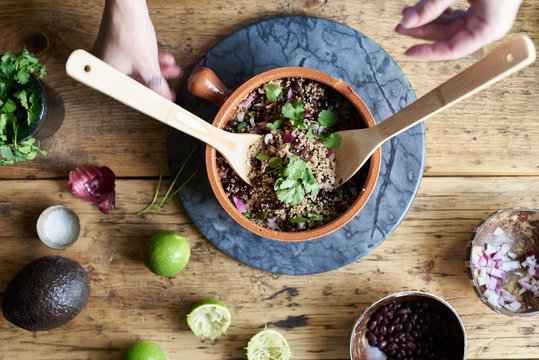 Woman Preparing Quinoa At Her Table.