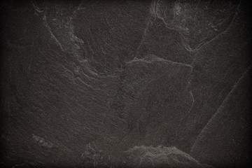 Dark grey black slate background or texture.