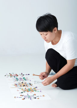 Mandala pattern with crystal and Asian women. a creator