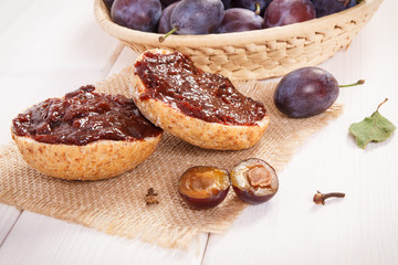 Sandwiches with plum marmalade or jam on jute burlap