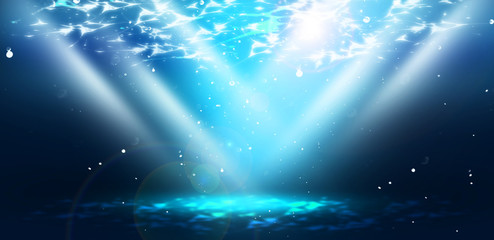 The depth of sea water, the underwater world, the rays of the sun through the water