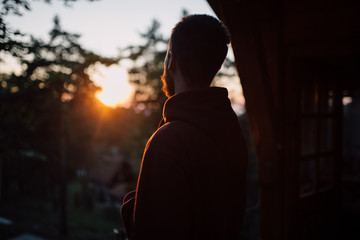 Portrait of man standing  on sunset