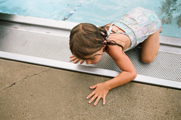 little girl at swimming pool