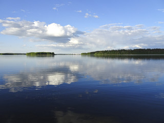 Summer landscape: a serene Sunny day on the lake