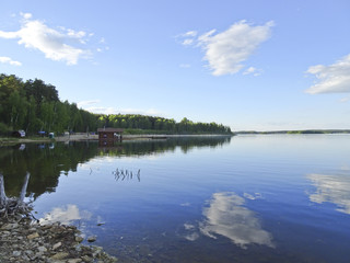 Summer landscape: a serene Sunny day on the lake