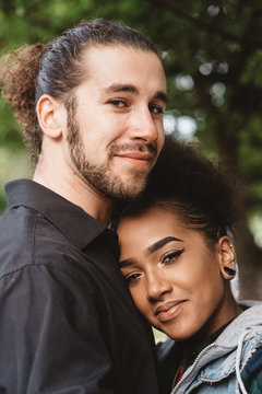 Portraits of a diverse young couple in the fall