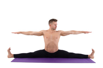 Stretching. Yoga and attractive man.
