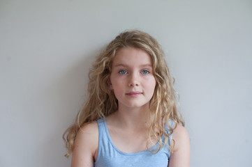 Portrait of a girl with blond curls