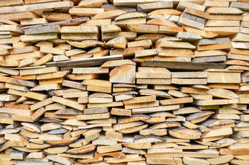 Stack of wooden bars or planks.