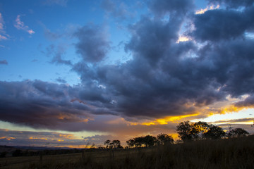 Fototapeta na wymiar Late afternoon stormy sunset in Stanthorpe, Queensland