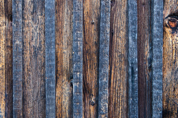 Rustic wooden background of weathered planks.