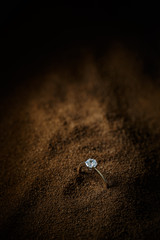 Ring with a polished gemstone