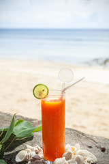 tropical papaya juice on the beach