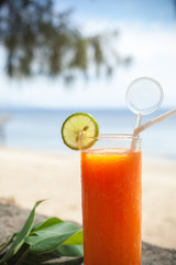 tropical papaya juice on the beach