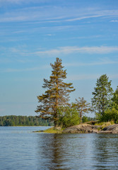 Naklejka premium Islands in the North of the Leningrad region on lake Vuoksa. Sunny morning on the water.