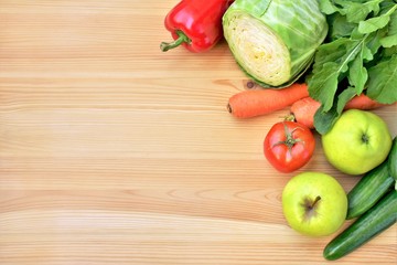 Fresh vegetables on a wooden board, copy space.