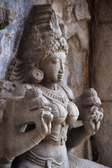 Carved idol in Gangaikondacholapuram Temple. Thanjavur, Tamil Nadu, India