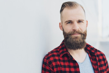 Obraz premium Portrait of a young man with hipster haircut