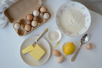 Process of making cookies with eggs, butter, flour, sugar, lemon and vanilla