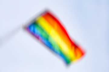 Gay rainbow flag, abstract motion blur effect.
