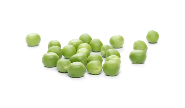 Fresh green peas isolated on white background