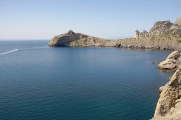 Fototapeta na wymiar Bay of the Black sea near the mountain Cape, like a dinosaur. Crimea.