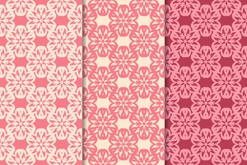 Set of red floral ornaments. Cherry pink vertical seamless patterns