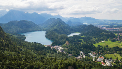 Fototapeta na wymiar Aerial view of a beautiful lake in the Alpine mountains