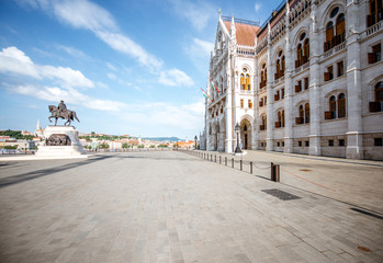 Morning view on the famous Parliament building with statue of Gyula Andrassy in Budapest, Hungary
