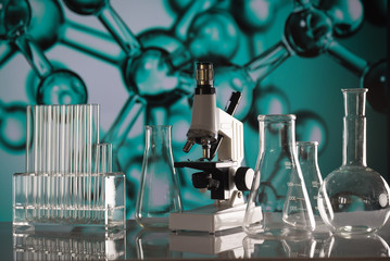Science laboratory research and development concept. microscope with test tubes