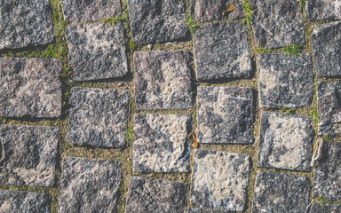 Close up of cobblestone pavement. Abstract background