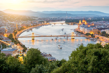 Aerial landscape view on the illuminated city during the twilight in Budapest, Hungary