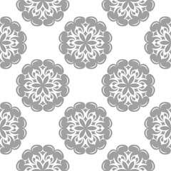 Fototapeta na wymiar Gray floral ornament on white background. Seamless pattern