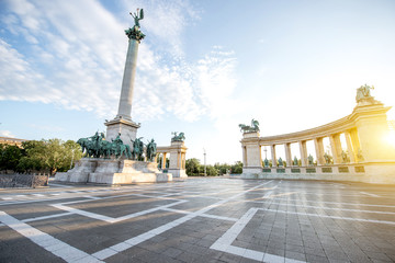 Fototapeta na wymiar Morning view on the empty Heroes square with monument and column during the sunny weather in Budapest, Hungary
