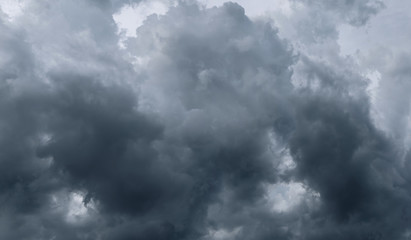 Dark storm clouds before rain used for climate background. Clouds become dark gray before raining. Dramatic background.