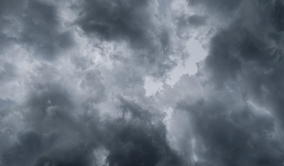 Dark storm clouds before rain used for climate background. Clouds become dark gray before raining. Dramatic background.