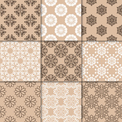 Brown beige floral ornaments. Collection of seamless patterns